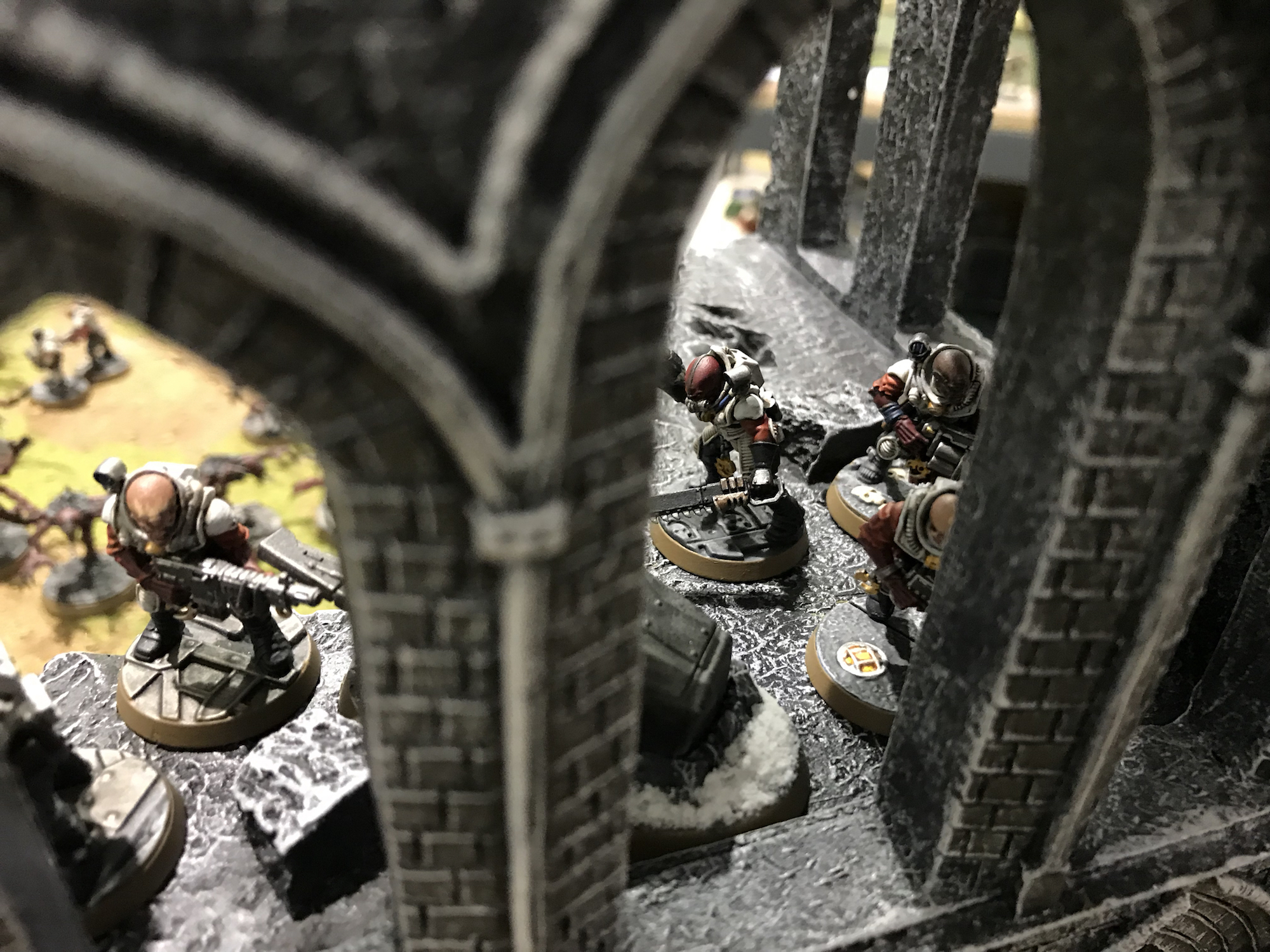Genestealer Cult members holding their objective - their dead pile is in the background - GSC & Tyranids vs Astra Militarum