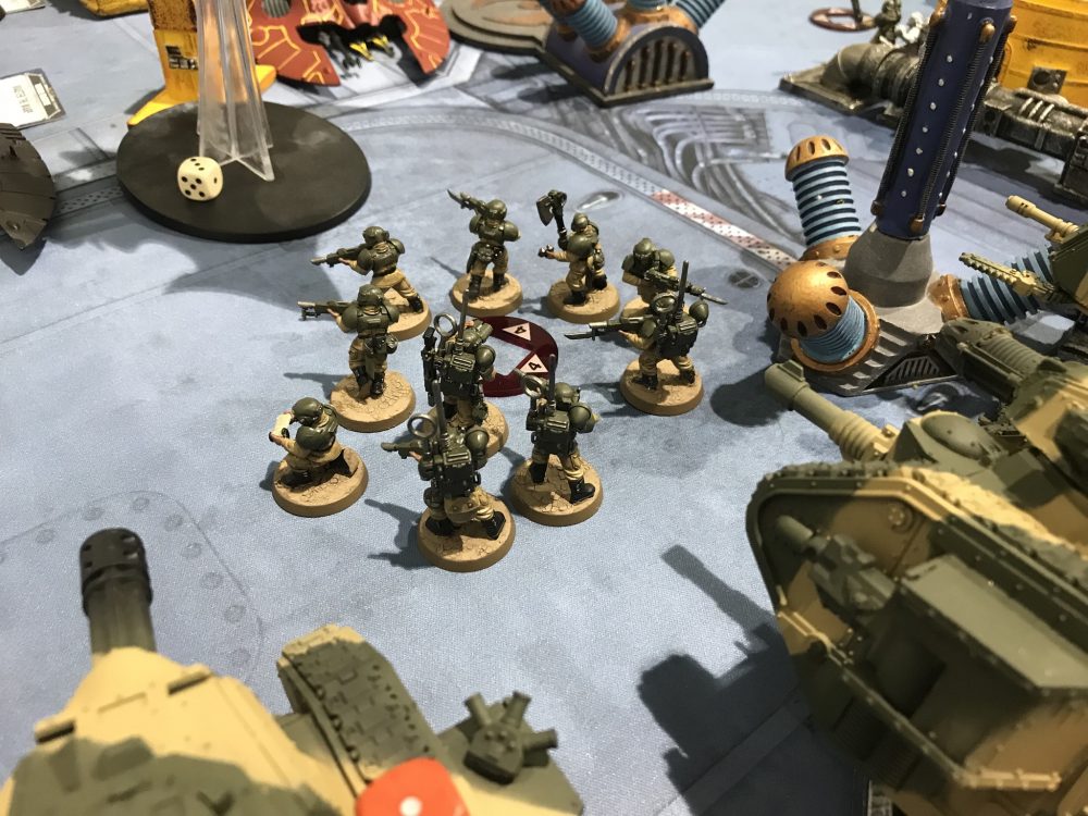 Guardsmen holding their objective - Aeldari vs Astra Militarum