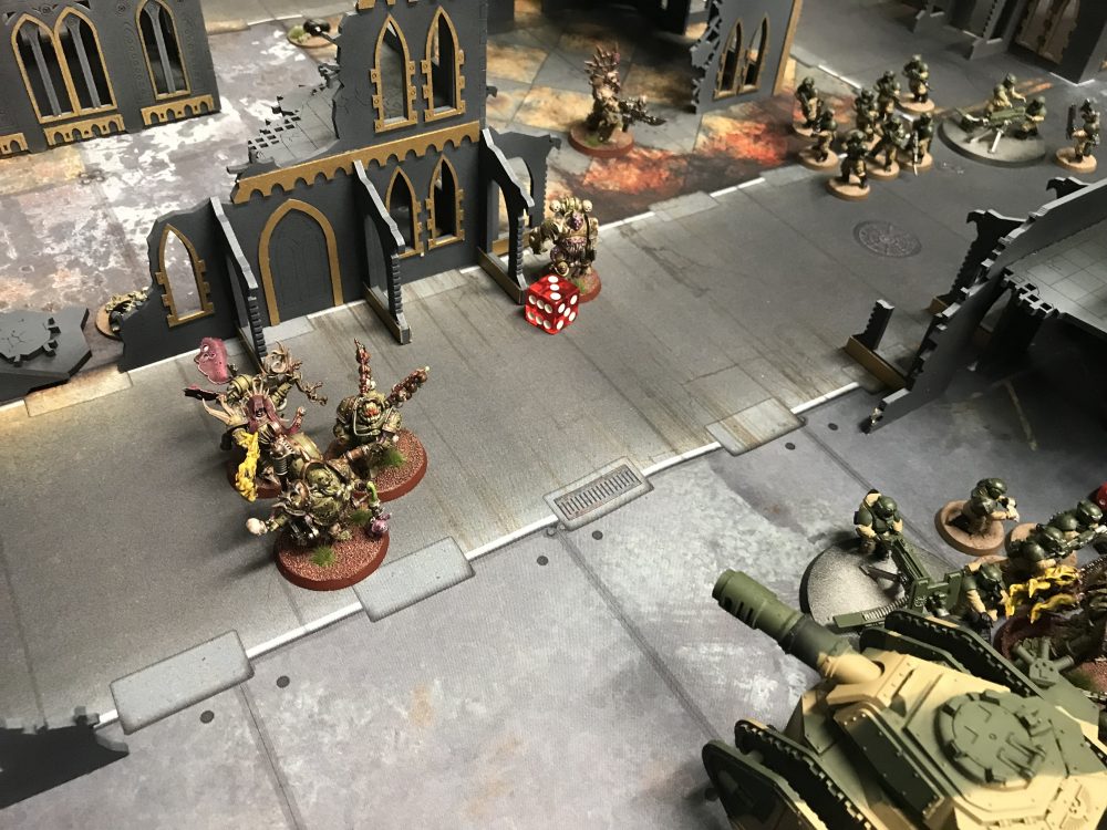 The combat is close and bloody at this point - Astra Militarum vs Death Guard