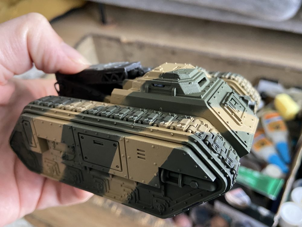 Here I have started tidying the camo edges with a brush